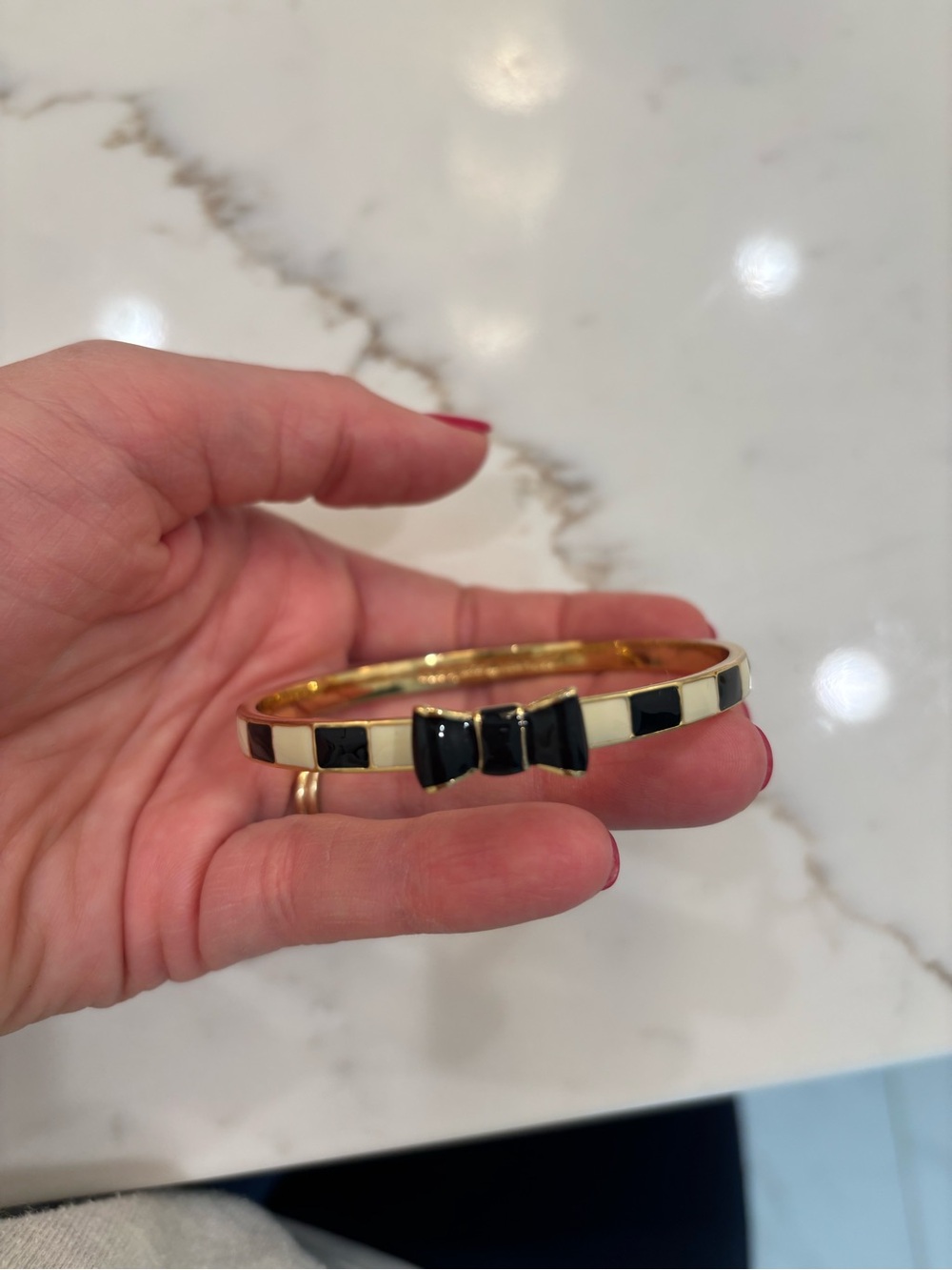 Kate Spade black and ivory bow bracelet